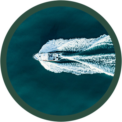 Overhead shot of a boat going through the sea
