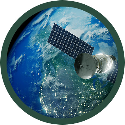 Satellite in space with Earth in shot behind