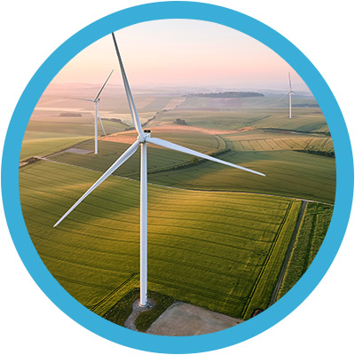 Wind turbines sitting in a field